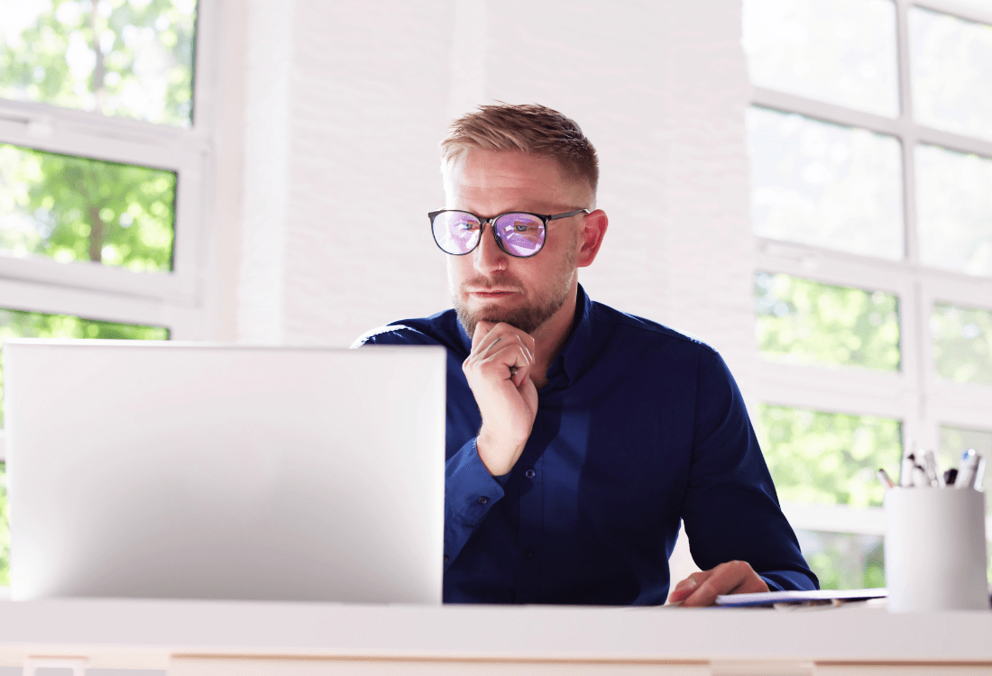 A property investment coach having an online session with their mentee. 